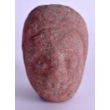 AN EARLY CONTINENTAL ANTIQUITY STONE HEAD. 5.5 cm x 7.5 cm.