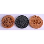 THREE CHINESE CARVED HARDSTONE DISCS. (3)