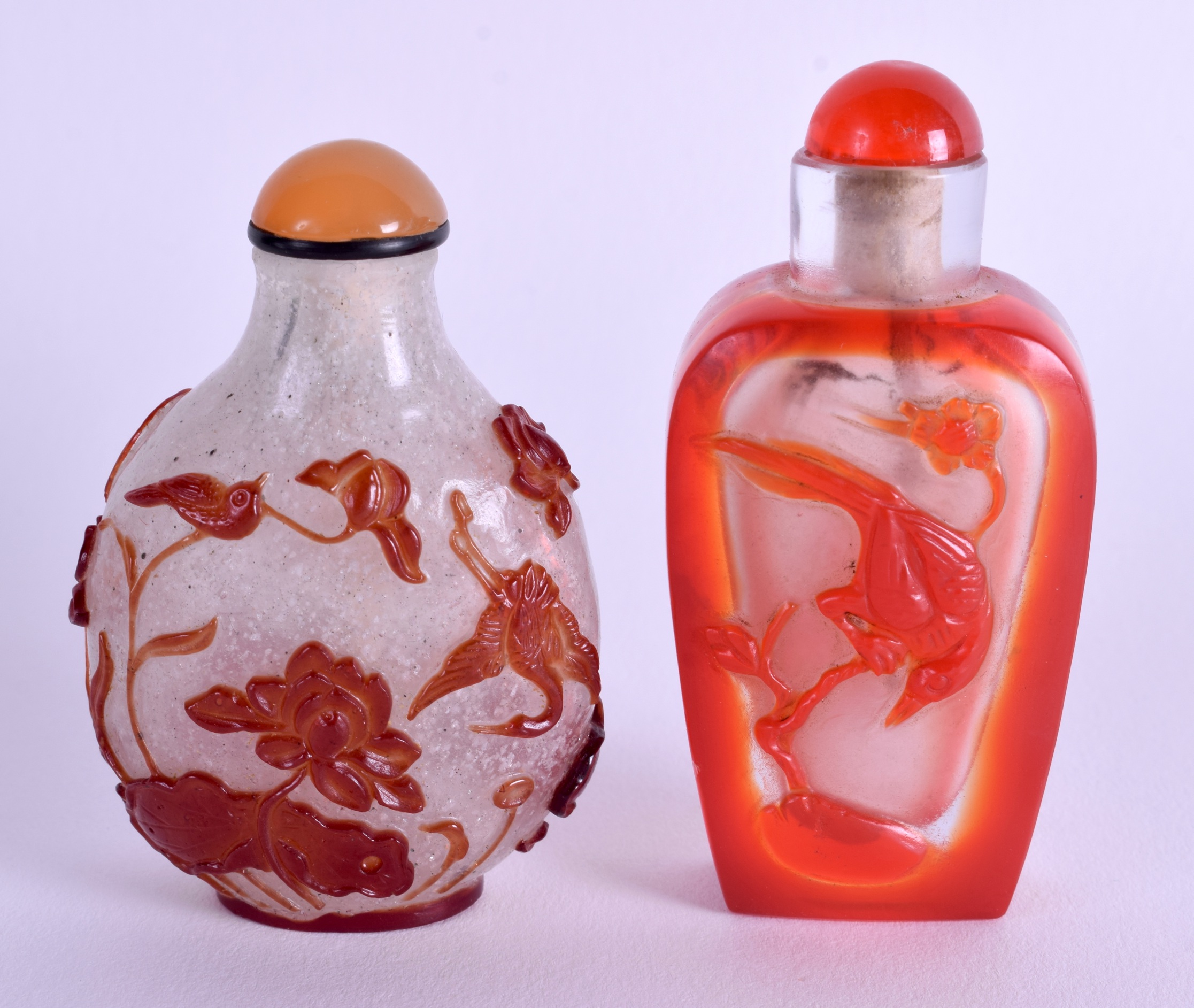 TWO CHINESE PEKING GLASS SNUFF BOTTLES. 7 cm & 6.5 cm high. (2)