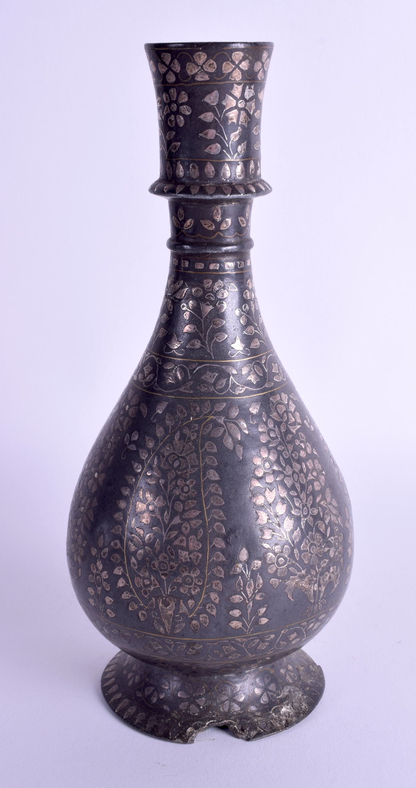 A 19TH CENTURY INDIAN SILVER INLAID BIDRI BRONZE VASE decorated with foliage. 25 cm high.