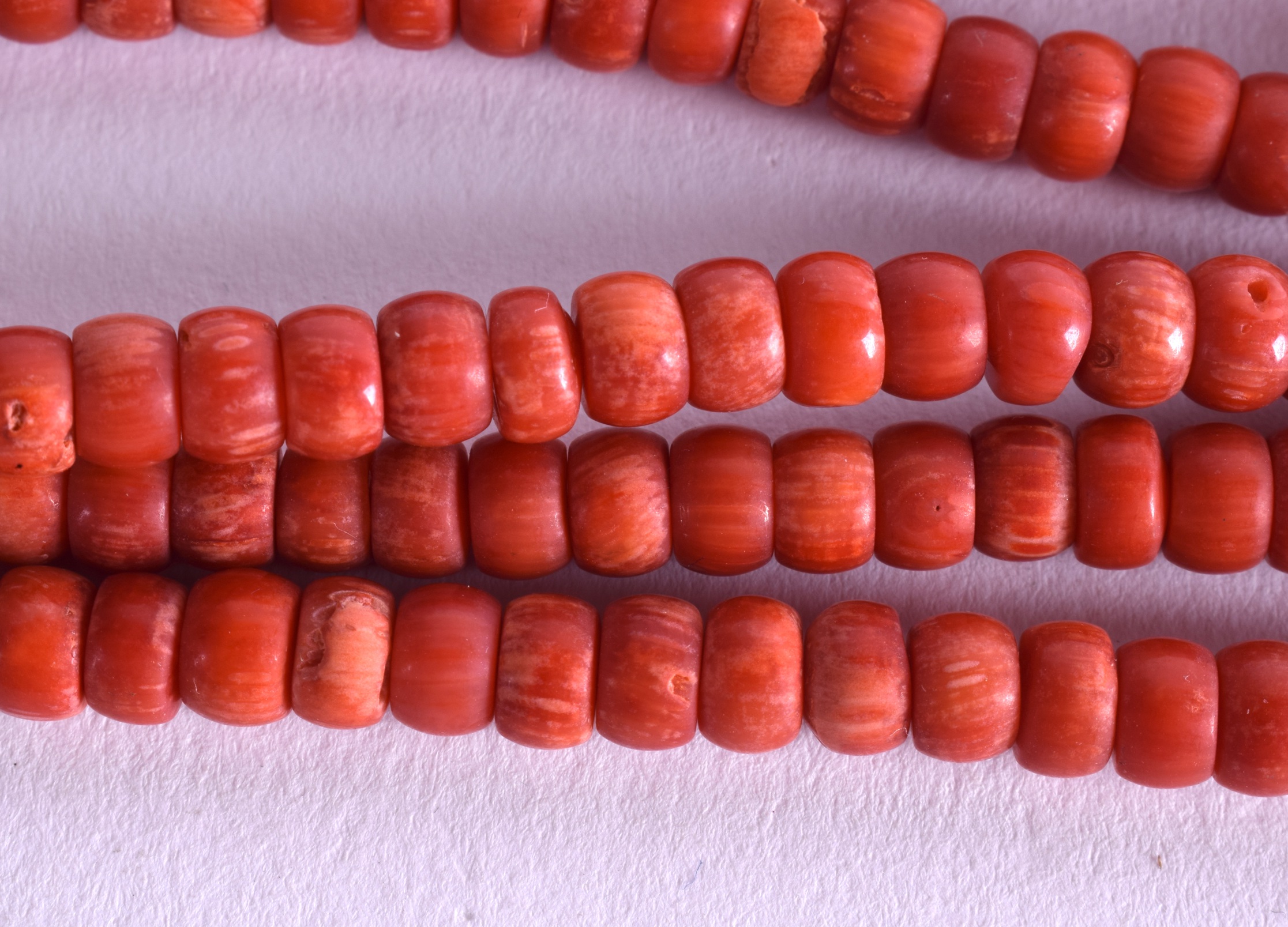 AN EARLY 20TH CENTURY SILVER AND CORAL NECKLACE. 74 grams. Each strand 36 cm long. - Image 2 of 2