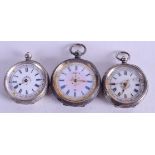 THREE SILVER FOB WATCHES. Largest 4 cm wide. (3)