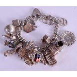 A SILVER CHARM BRACELET. 100 grams.