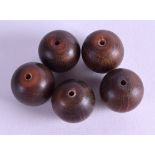 FIVE 19TH CENTURY CHINESE CARVED BUFFALO HORN TOGGLES. (5)