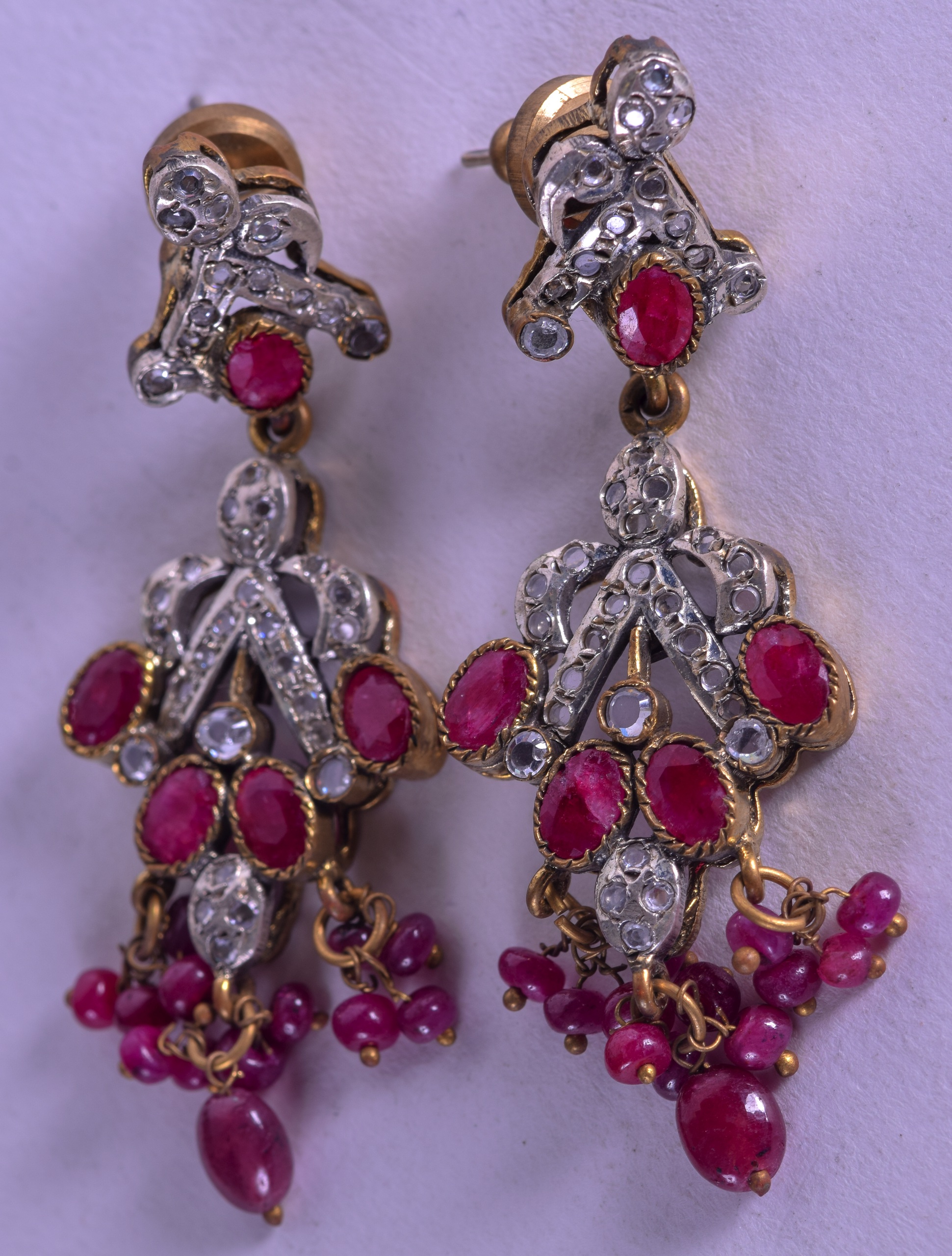 A PAIR OF SILVER GILT AND RUBY EARRINGS. 18.6 grams.