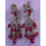 A PAIR OF SILVER GILT AND RUBY EARRINGS. 18.6 grams.