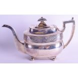 A GEORGE III SILVER TEAPOT. London 1811. 24 oz. 29 cm wide.