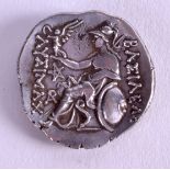 A SILVER COIN. 15.7 grams. 2.5 cm wide.