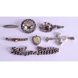 FOUR VINTAGE SILVER BROOCHES a silver Celtic brooch etc. (7)