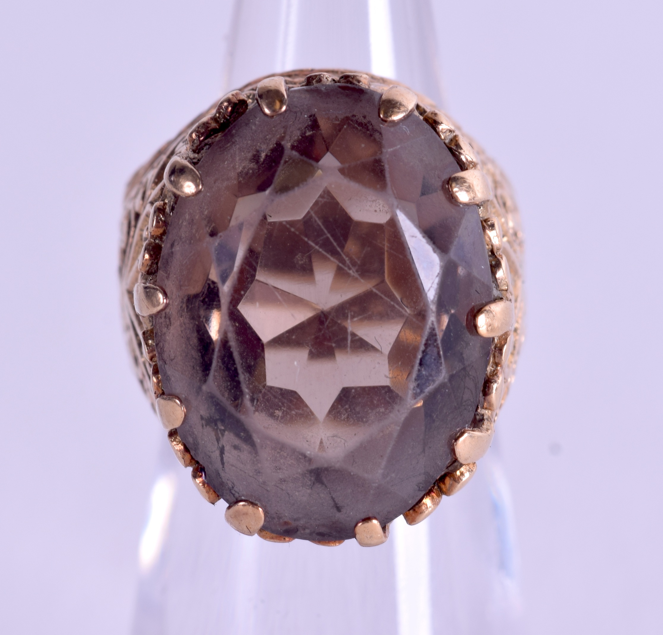 A 9CT GOLD SMOKEY QUARTZ RING. Size F.