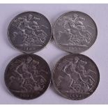 FOUR SILVER CROWNS. (4)