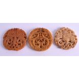 THREE CHINESE CARVED HARDSTONE DISCS. (3)