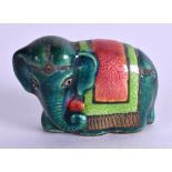 AN EARLY 20TH CENTURY INDIAN ENAMEL FIGURE OF AN ELEPHANT. 5 cm wide.