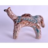 A CENTRAL ASIAN POTTERY FIGURE OF A CAMEL. 14 cm wide.