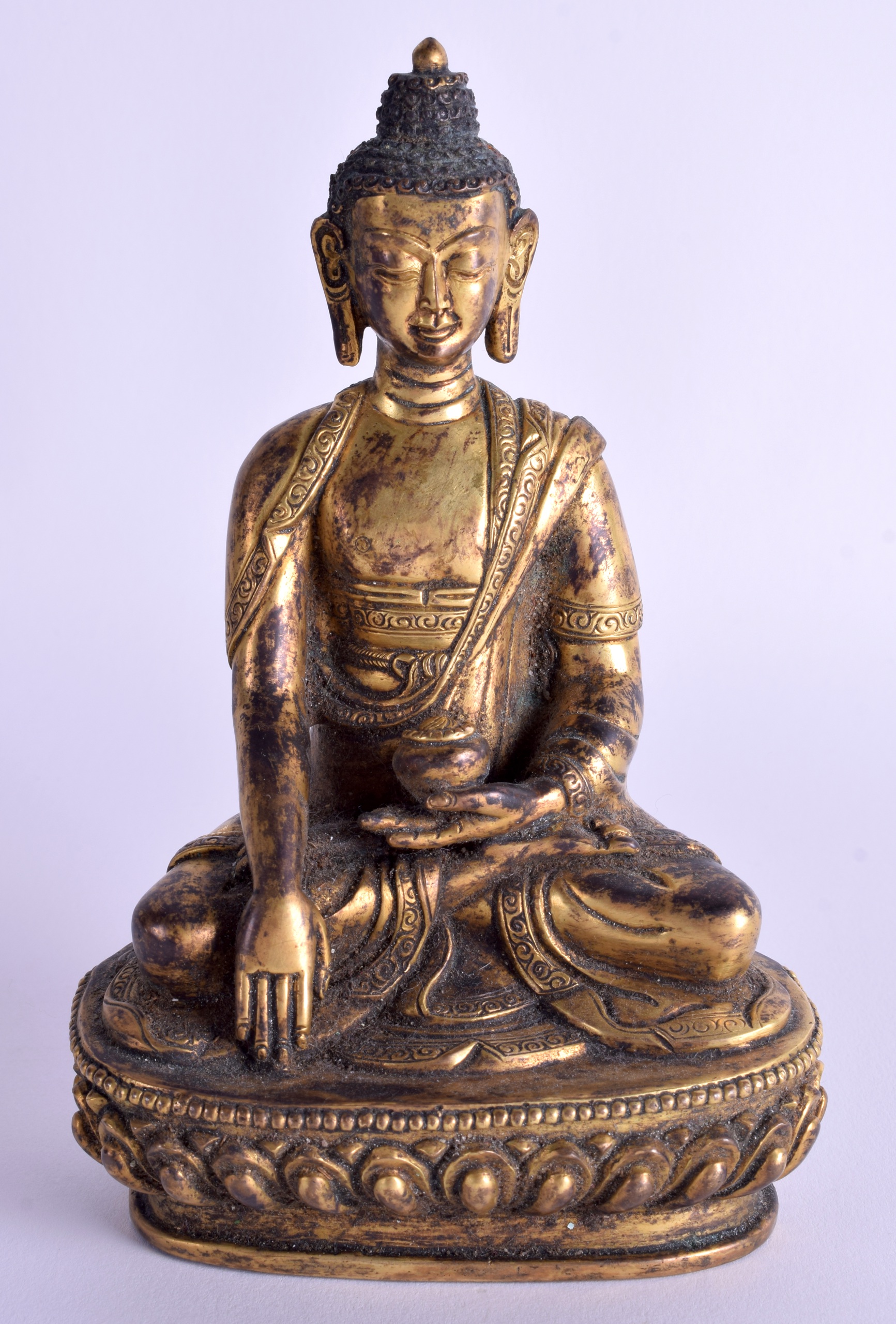 A CHINESE TIBETAN GILT BRONZE BUDDHA. 16 cm high.