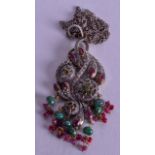 A SILVER EMERALD AND RUBY PENDANT. 17 grams.