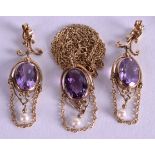 AN ART NOUVEAU 9CT GOLD AND AMETHYST NECKLACE with matching earrings. (3)