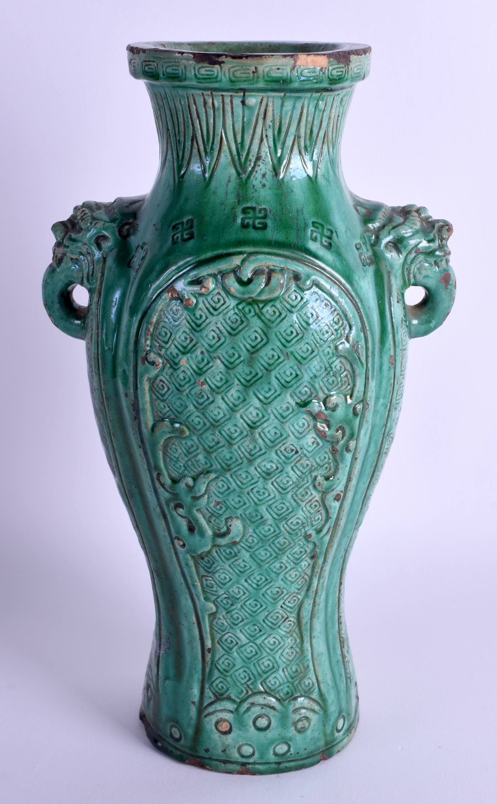 A LARGE 19TH CENTURY CHINESE TWIN HANDLED VASE decorated with motifs. 30 cm high.
