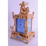 A LARGE ORMOLU AND PORCELAIN MANTEL CLOCK by Vincenti Rose. 30 cm high.