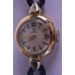 A LADIES 9CT GOLD LADIES OMEGA WRISTWATCH. 1.5 cm wide.