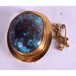 A VICTORIAN GOLD AND TURQUOISE BROOCH. 3.25 cm x 2 cm.