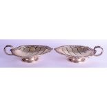 A PAIR OF CONTINENTAL ITALIAN SILVER LEAF SHAPED DISHES. 20 oz. 20 cm long.