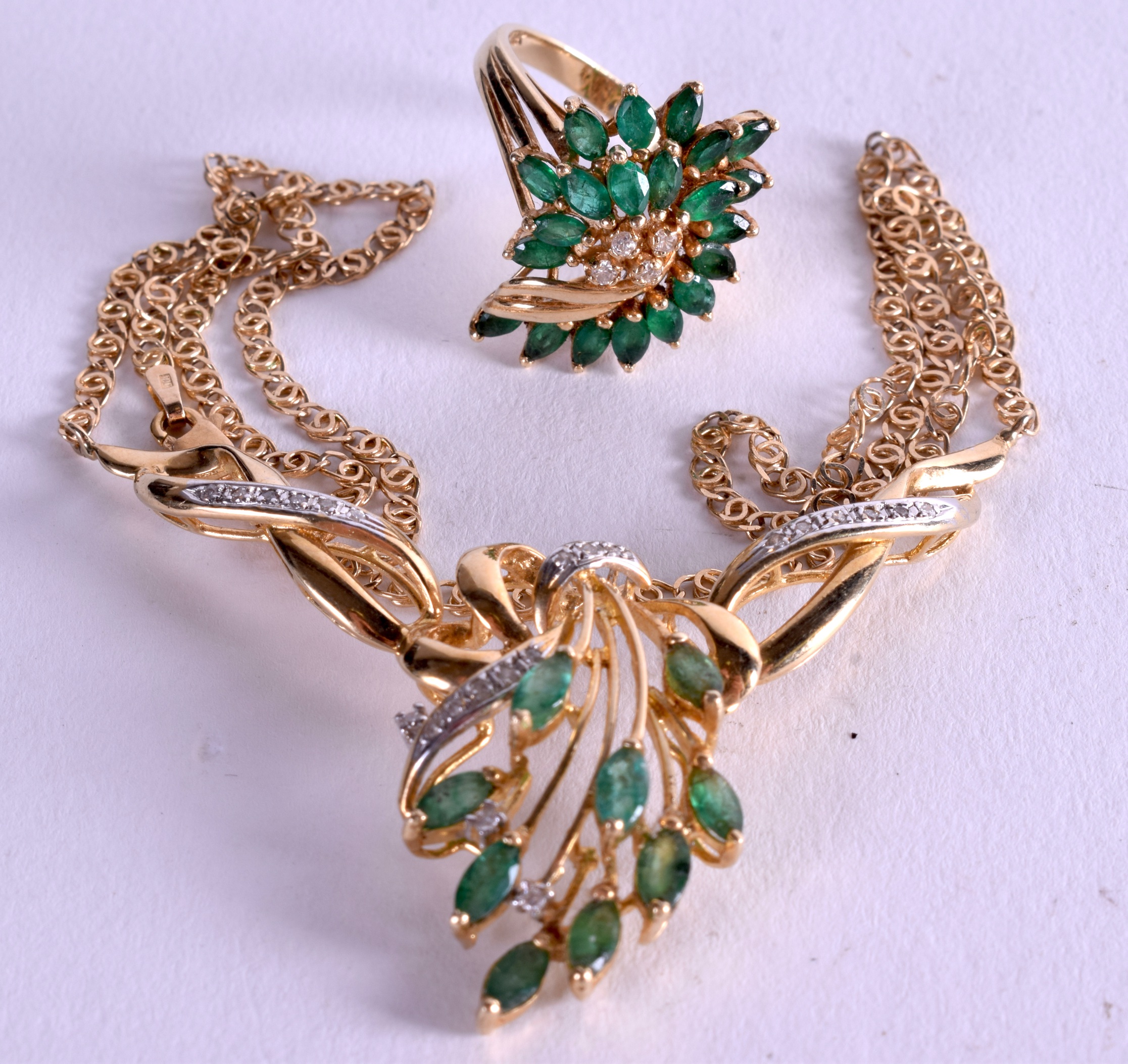 A 14CT GOLD EMERALD AND DIAMOND NECKLACE together with a matching ring. Size N. (2)