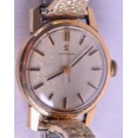 A 9CT GOLD LADIES OMEGA WRISTWATCH. 2 cm wide.