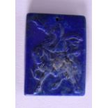 A CHINESE CARVED LAPIS LAZULI TABLET. 3.5 cm x 4.5 cm.