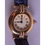 A SILVER GILT CARTIER WRISTWATCH. 2.25 cm wide.