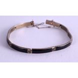 AN ART DECO SILVER AND BLACK ENAMEL BRACELET. 19 cm long.