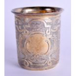 A 19TH CENTURY RUSSIAN SILVER GILT BEAKER decorated with foliage. 7.5 cm high.