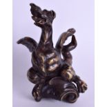 A GOOD EARLY 18TH CENTURY EUROPEAN BRONZE FIGURE OF A GROTESQUE BIRD modelled emerging upon a scroll