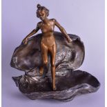 AN ART NOUVEAU EUROPEAN BRONZE FIGURE OF A NUDE FEMALE modelled emerging from a clam shell. 19 cm x