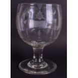 A LARGE 18TH/19TH CENTURY MASONIC CLEAR GLASS GOBLET decorated with motifs. 23 cm x 14 cm.