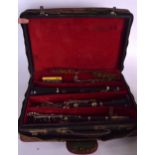 A BOOSEY AND HAWKES EMPEROR CLARINET, contained within a fitted case.