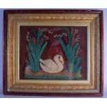 A VICTORIAN FRAMED EMBROIDERED WOOL WORK PANEL depicting a duck swimming. Image 58 cm x 35 cm.