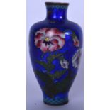 AN EARLY 20TH CENTURY JAPANESE CLOISONNE ENAMEL BALUSTER VASE, decorated with bold foliage. 16.5 cm