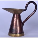 AN ARTS & CRAFTS WILLIAM SOUTTER & SONS COPPER AND BRASS HAMMERED JUG, formed with a high loop handl