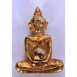 A THAI GILT BRONZE STATUE OR FIGURE OF BUDDHA, formed seated holding an orb. 7.2 cm high.