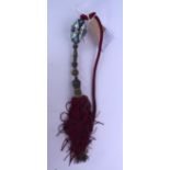 A TURKISK POTTERY HANGING ORNAMENT, with original tassel. 87 cm long.