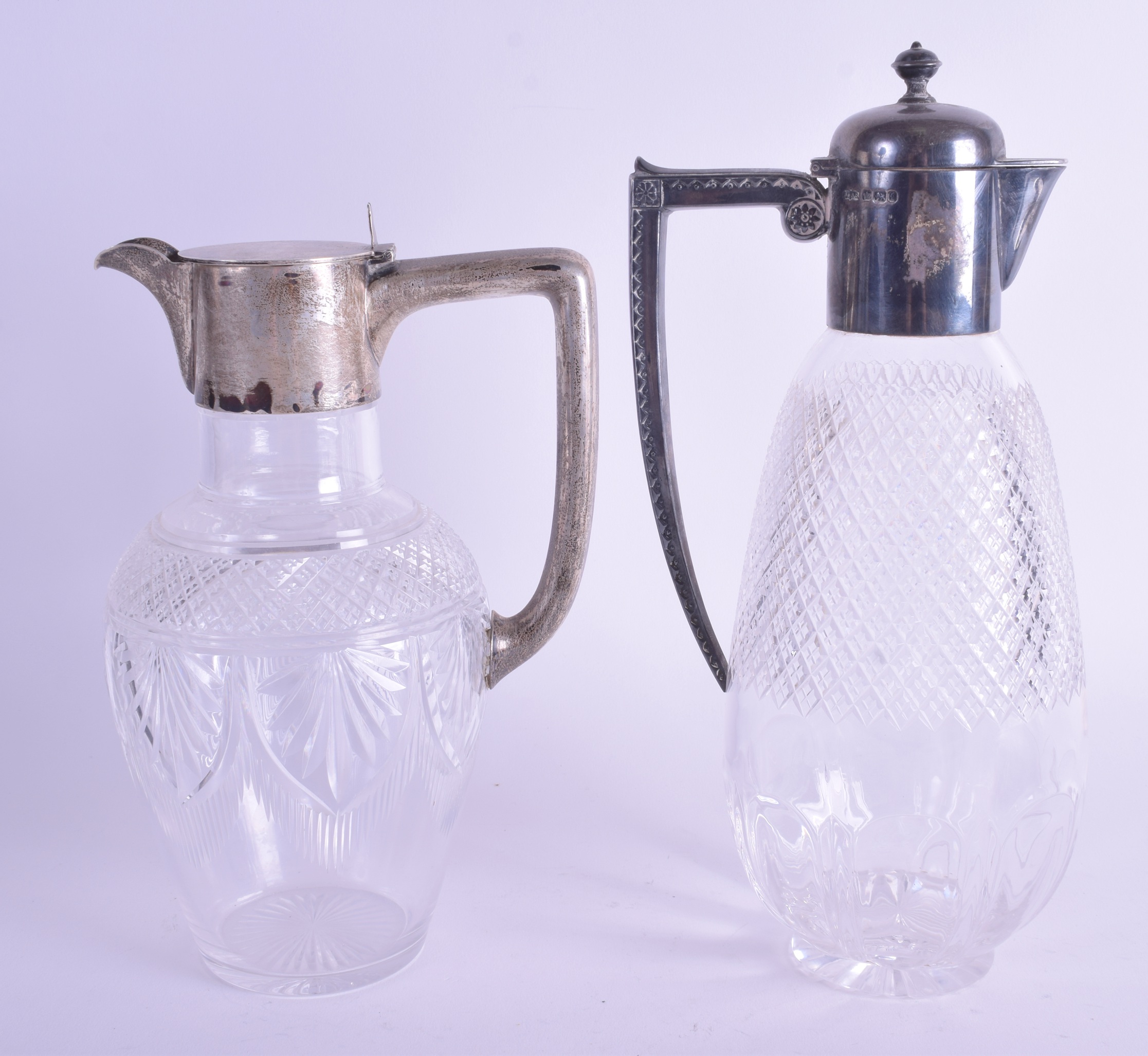 TWO ANTIQUE SILVER AND CUT GLASS CLARET JUGS. 27 cm & 22 cm high. (2) - Image 2 of 4