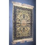 A BEIGE GROUND PERSIAN PRAYER RUG, decorated with extensive foliage. 110 cm x 63 cm.