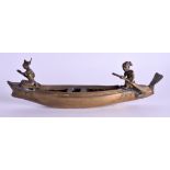 A 19TH CENTURY INDIAN BRONZE FIGURE OF A CANOE modelled with two attendants. 30 cm long.