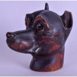 A 19TH BAVARIAN BLACK FOREST CARVED WOOD INKWELL in the form of a dogs head. 10 cm x 10 cm.