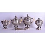 A GOOD 19TH CENTURY SOUTH EAST ASIAN SILVER FOUR PIECE TEASET decorated with buddhistic goads and ex