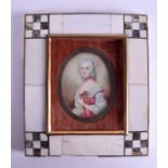 AN EARLY 20TH CENTURY CONTINENTAL PAINTED IVORY PORTRAIT MINIATURE painted with a female. Ivory 5.5