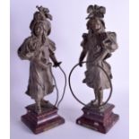 A PAIR OF 19TH CENTURY SPELTER FIGURES OF FEMALES modelled upon marble bases. 37 cm high.