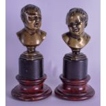 A PAIR OF 19TH CENTURY FRENCH BRONZE BUSTS modelled as howling children. 15.5 cm high.