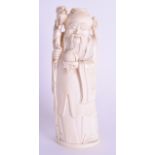 A 19TH CENTURY CHINESE CARVED IVORY FIGURE OF AN IMMORTAL modelled holding a peach. 19.5 cm high.